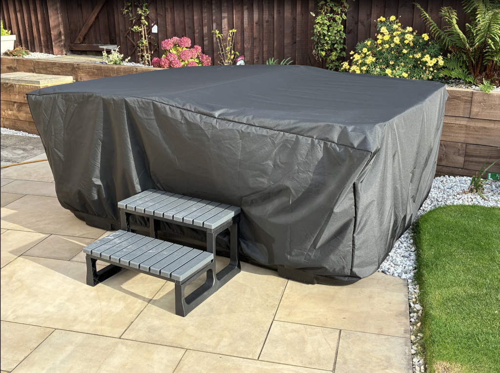 custom-spa-cover-australia.jpg Custom made spa cover in grey fitted over a spa on a paved patio – The Cover Company Australia